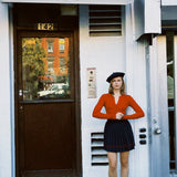 COLETTE PLEATED KNIT MINI SKIRT