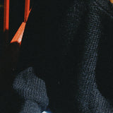 NOIR KNOTTED SWEATER